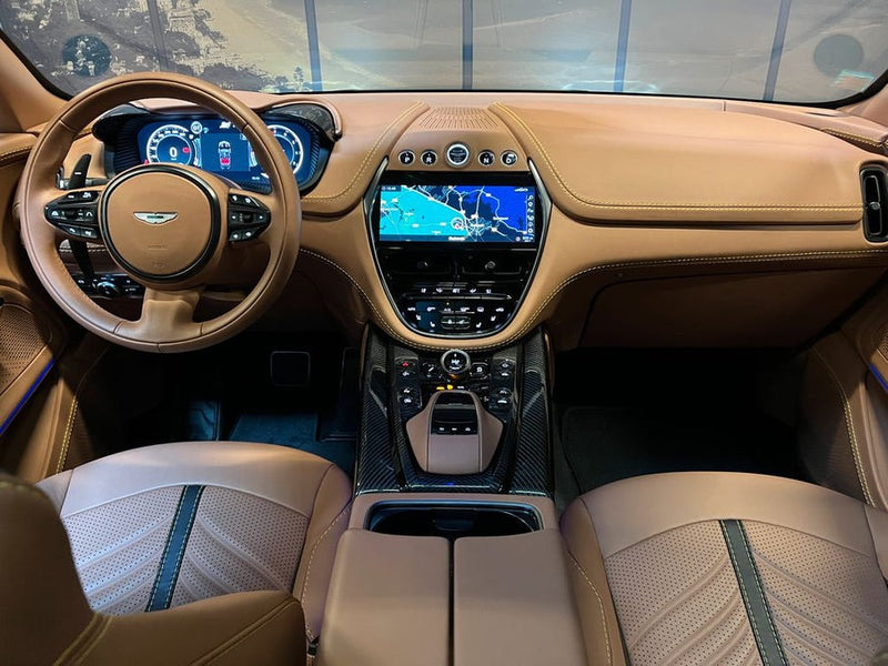 How do I use Apple CarPlay in an Aston Martin DBX?