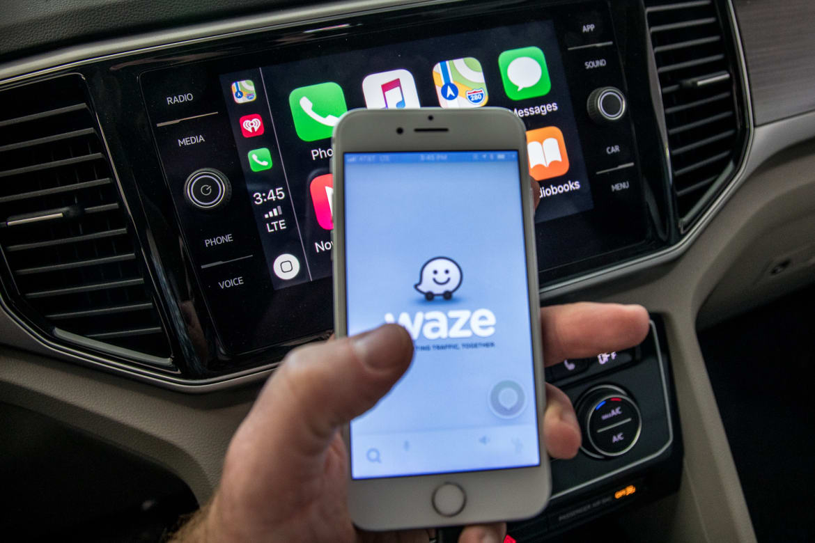 Waze on Carplay is the "free iCoyote"