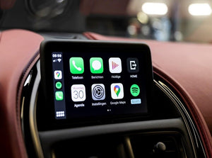 Apple CarPlay system for Aston Martin, offering advanced connectivity and seamless integration with the vehicle's infotainment system.