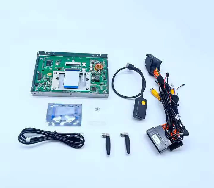Collection of electronic components and cables on a white background